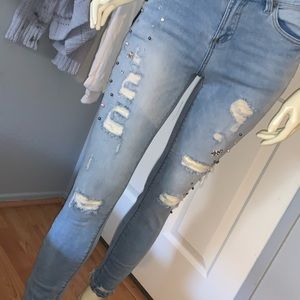 Pearl and crystal ripped skinny jeans